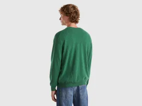 Grüner melierter Pullover mit Rundhalsausschnitt aus reiner Merinowolle